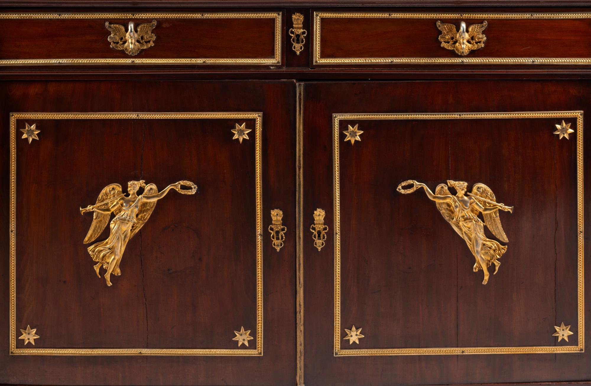 An Empire Style Gilt Bronze Mounted Mahogany Serving Cabinet