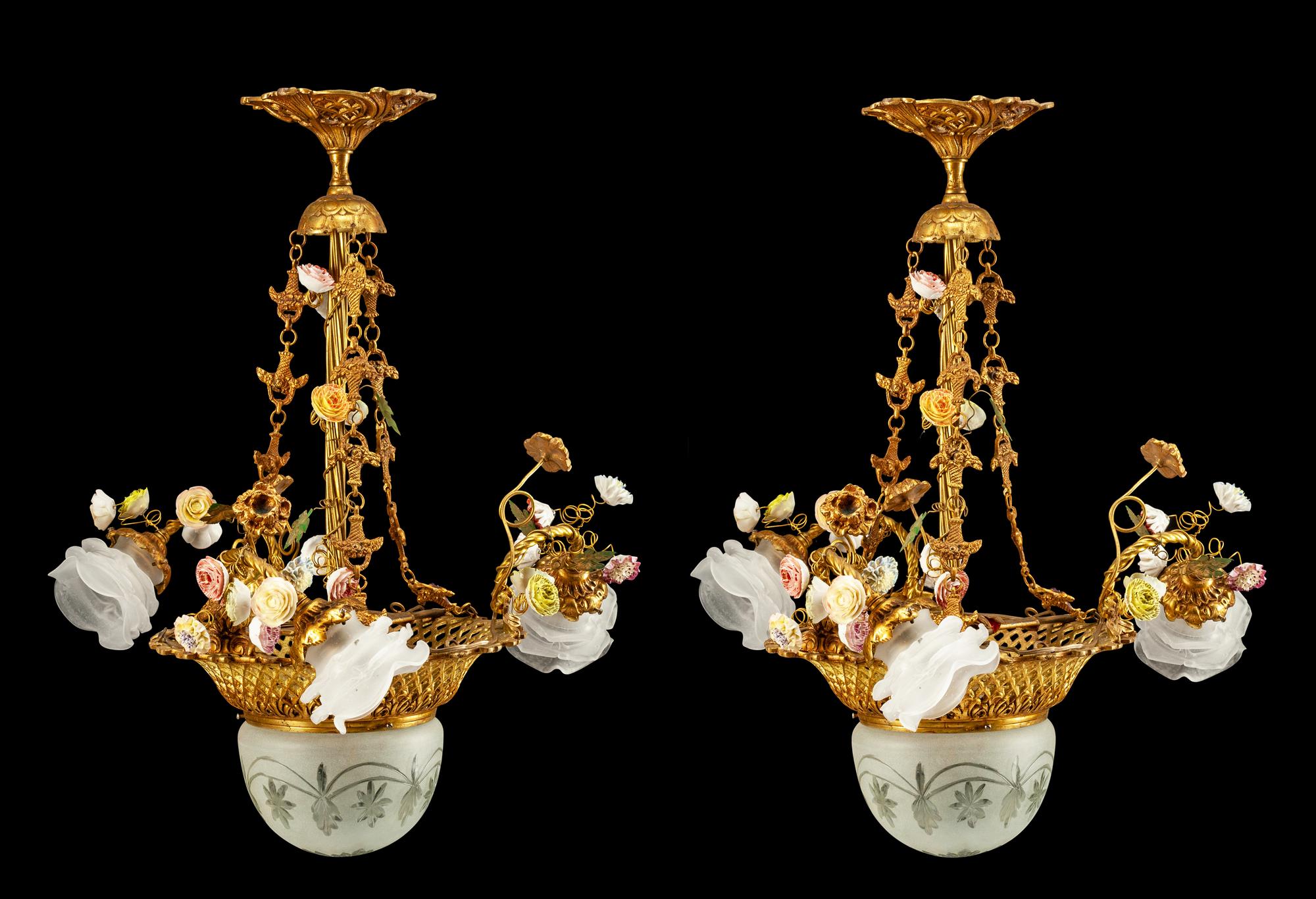 A Pair of Louis XV Style Gilt Bronze and Porcelain Four-Light Chandeliers