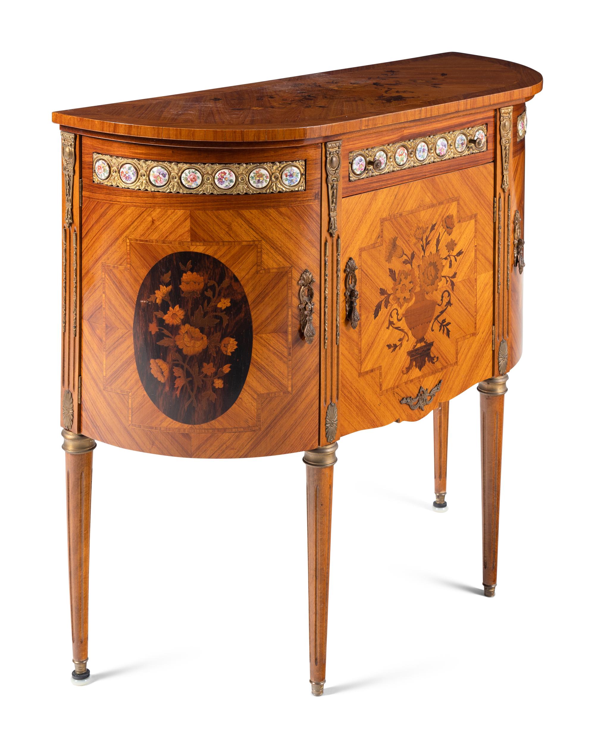 A Louis XVI Style Marquetry, Gilt Metal and Porcelain Mounted Side Cabinet