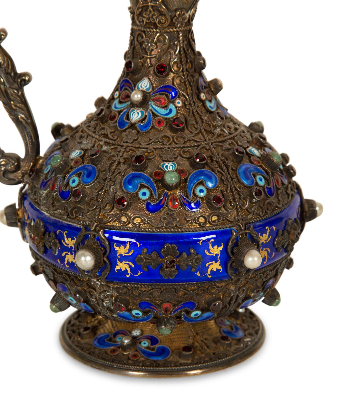 A Continental Enameled and Gem-Encrusted Silver-Gilt Wine Ewer
