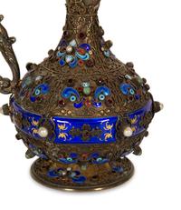 A Continental Enameled and Gem-Encrusted Silver-Gilt Wine Ewer