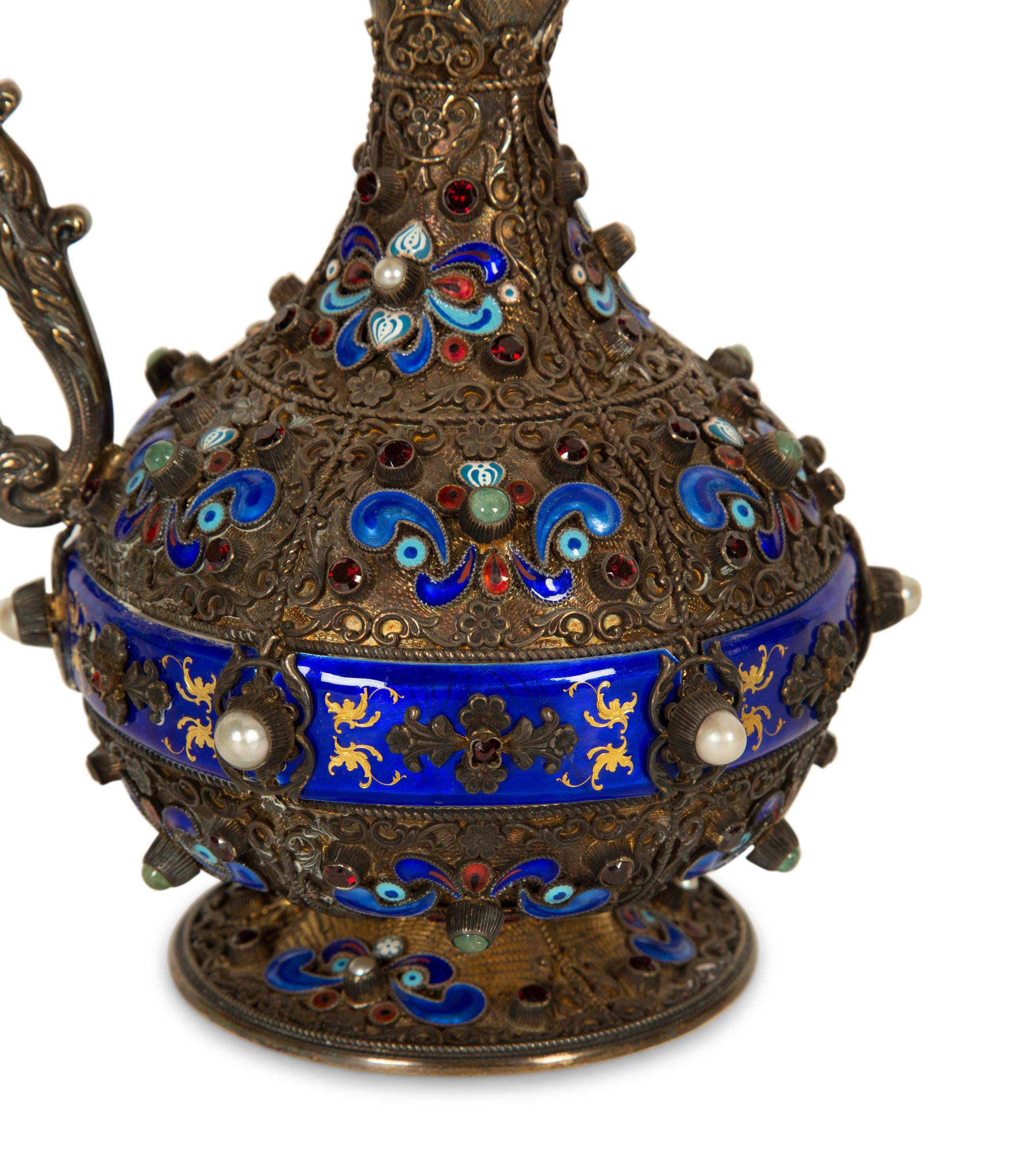 A Continental Enameled and Gem-Encrusted Silver-Gilt Wine Ewer