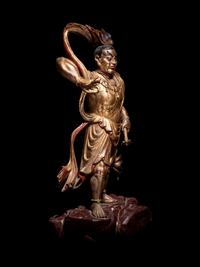 A Pair of Gilt and Red Lacquered Wood Figures of Guardians