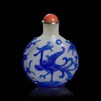 A Chinese Blue Overlaid Glass "Phoenix and Pine" Snuff Bottle