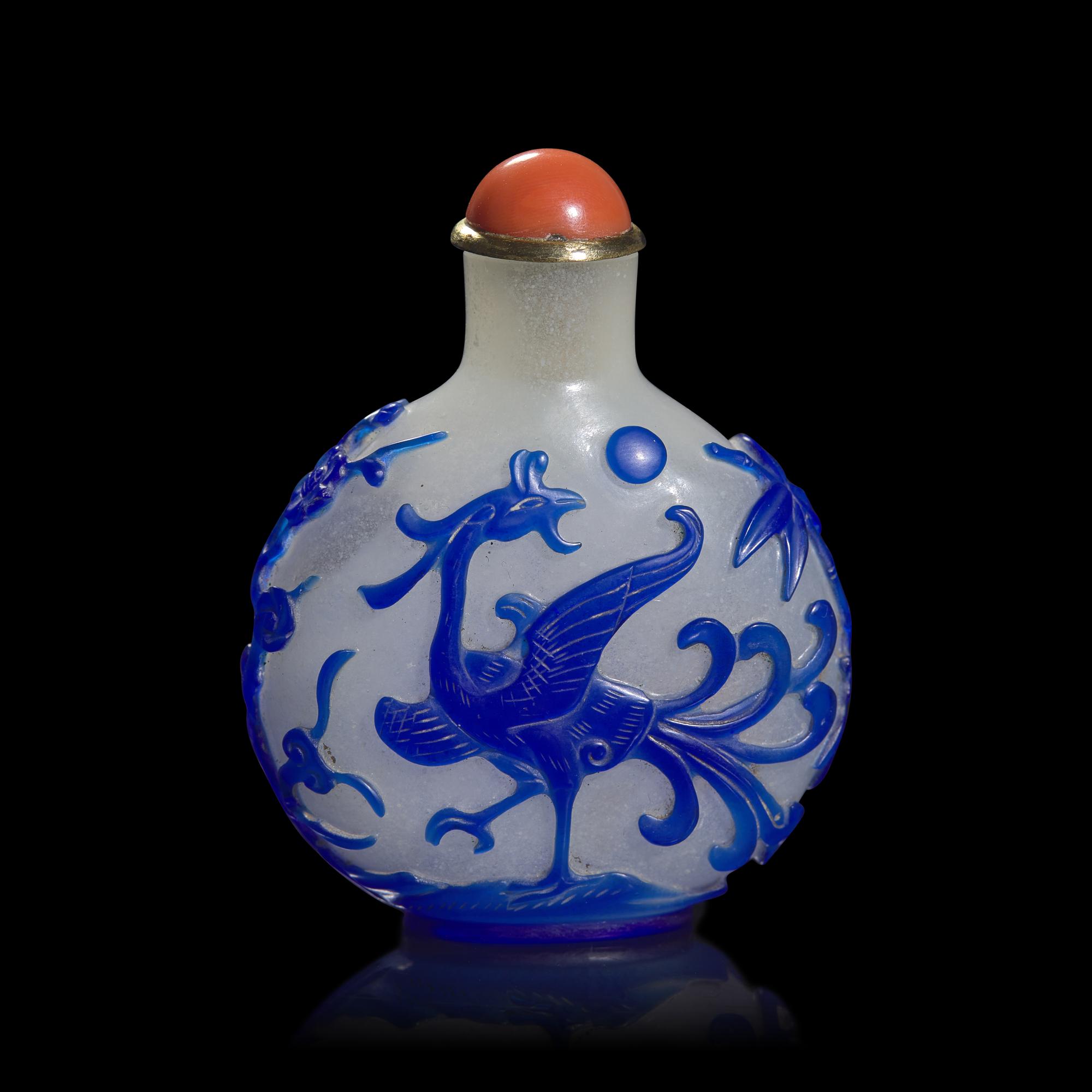 A Chinese Blue Overlaid Glass "Phoenix and Pine" Snuff Bottle