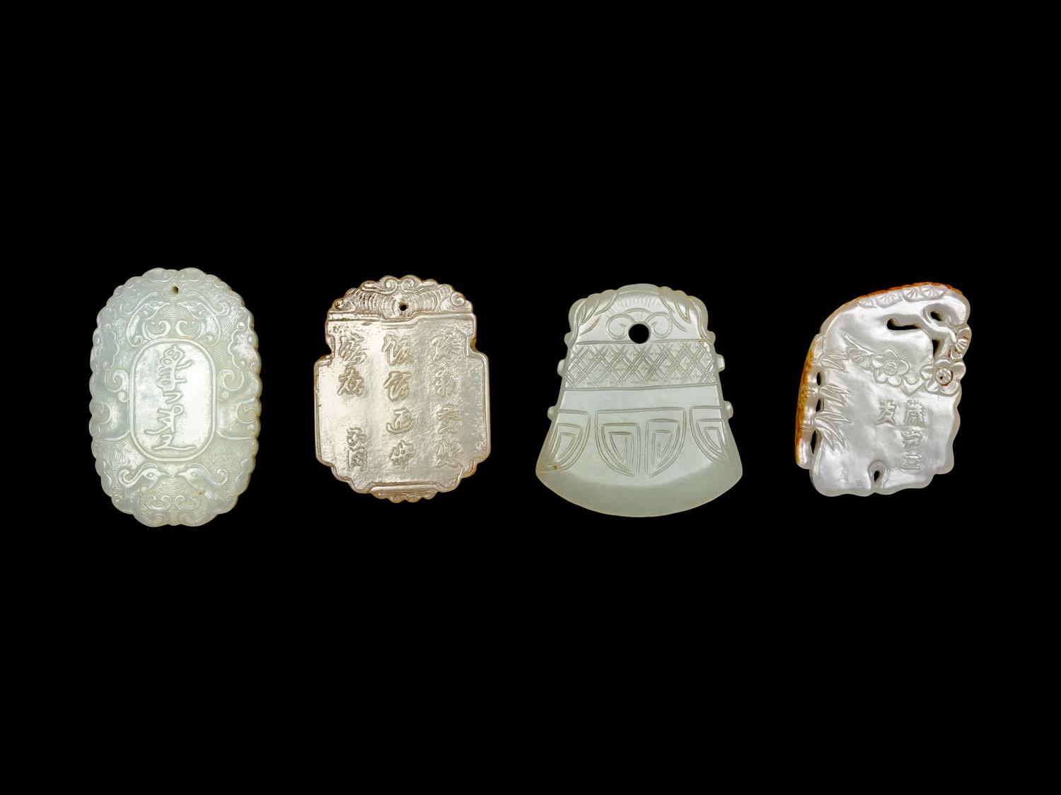 Four Chinese Celadon Carved Jade Plaques