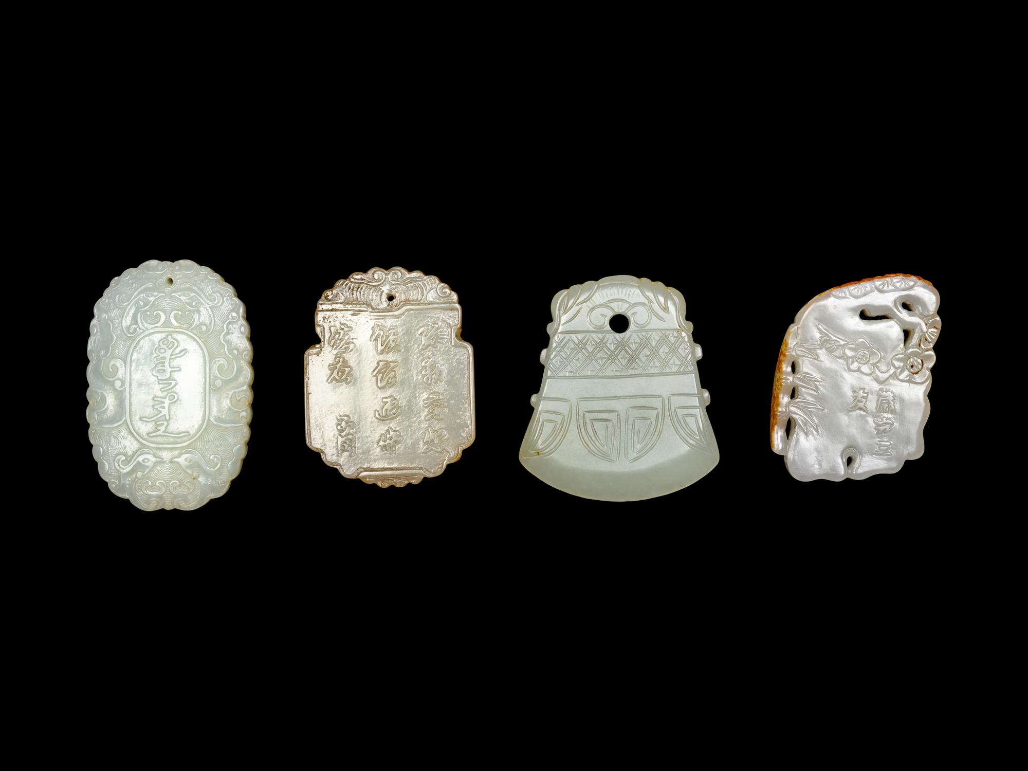 Four Chinese Celadon Carved Jade Plaques