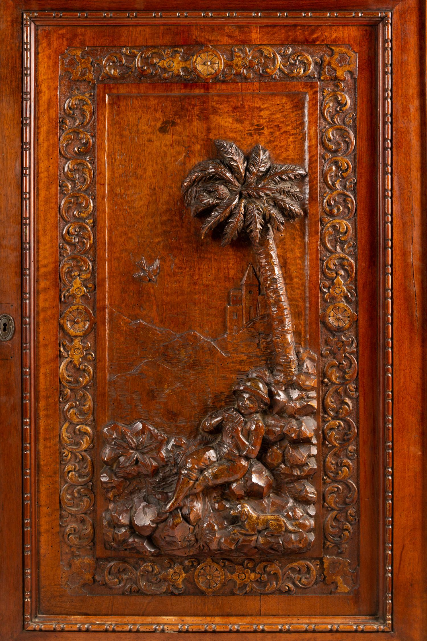 A Pair of French Renaissance Revival Parcel Gilt Cabinets