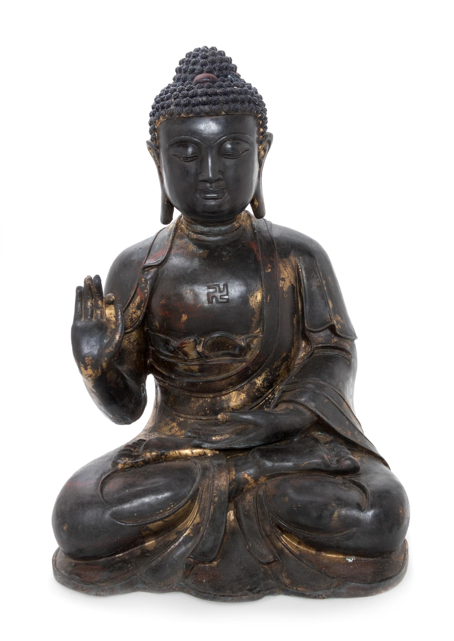 A Chinese Gilt Bronze Figure of Buddha