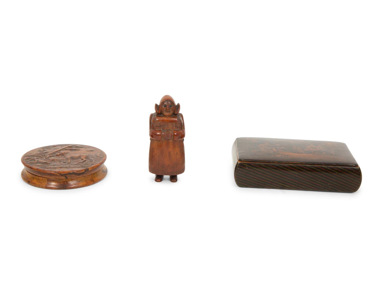 A Scottish Mauchline Ware Table Snuff Box, a French Pressed Wood Box and a Carved Dutch Girl Figural Snuff Box