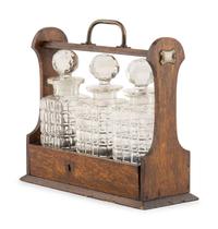 An English Oak and Cut Glass Tantalus