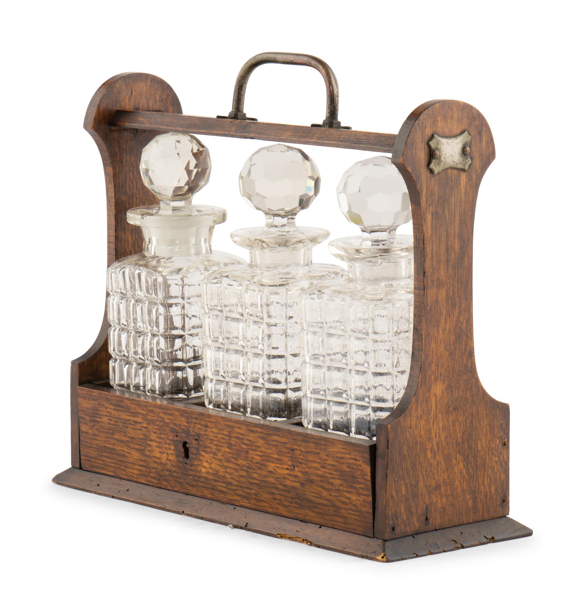 An English Oak and Cut Glass Tantalus