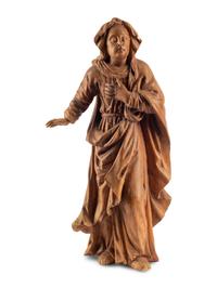 A Continental Carved Fruitwood Saint Figure