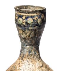 A Ilkhanid Clear-Glazed Ewer