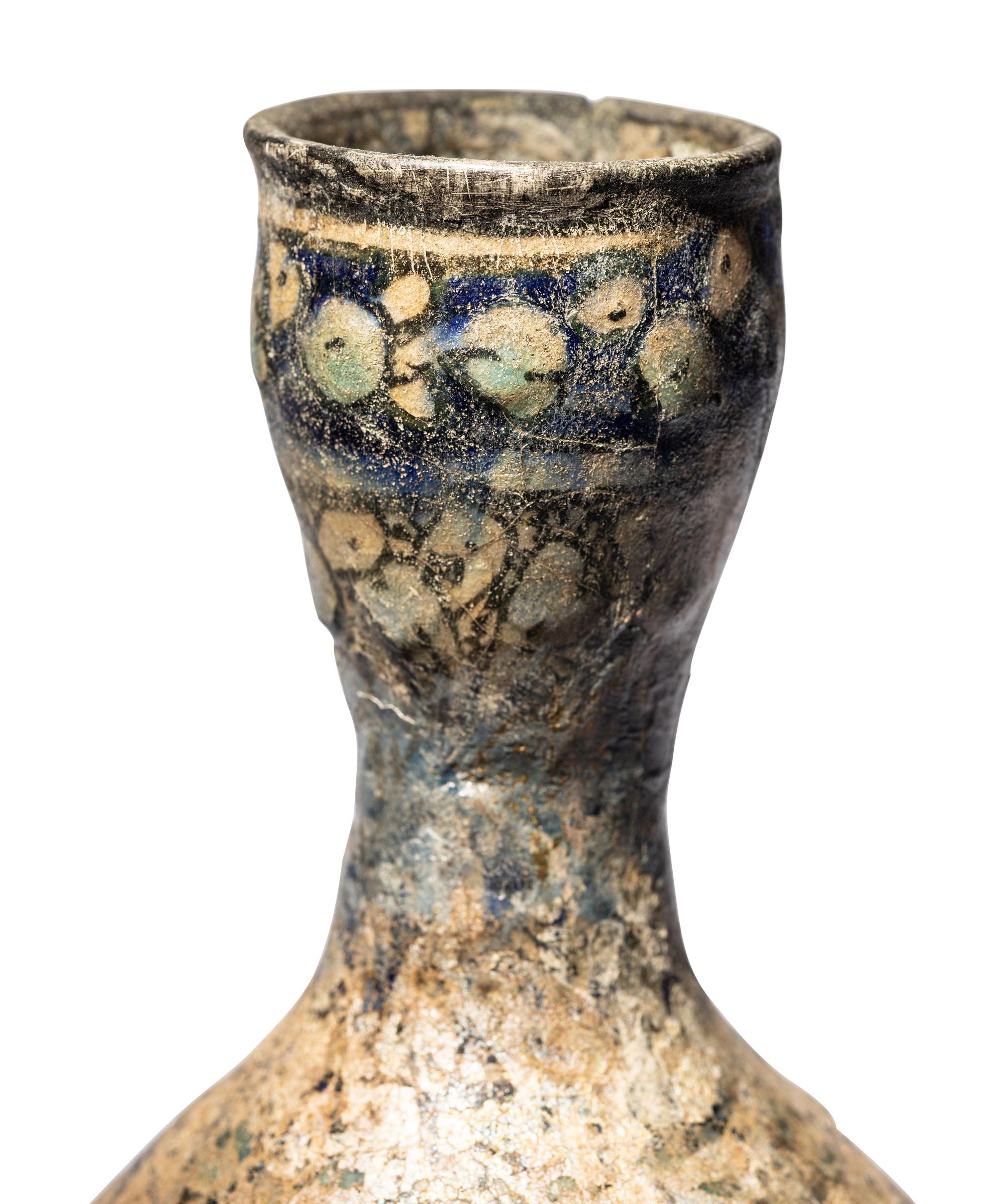 A Ilkhanid Clear-Glazed Ewer