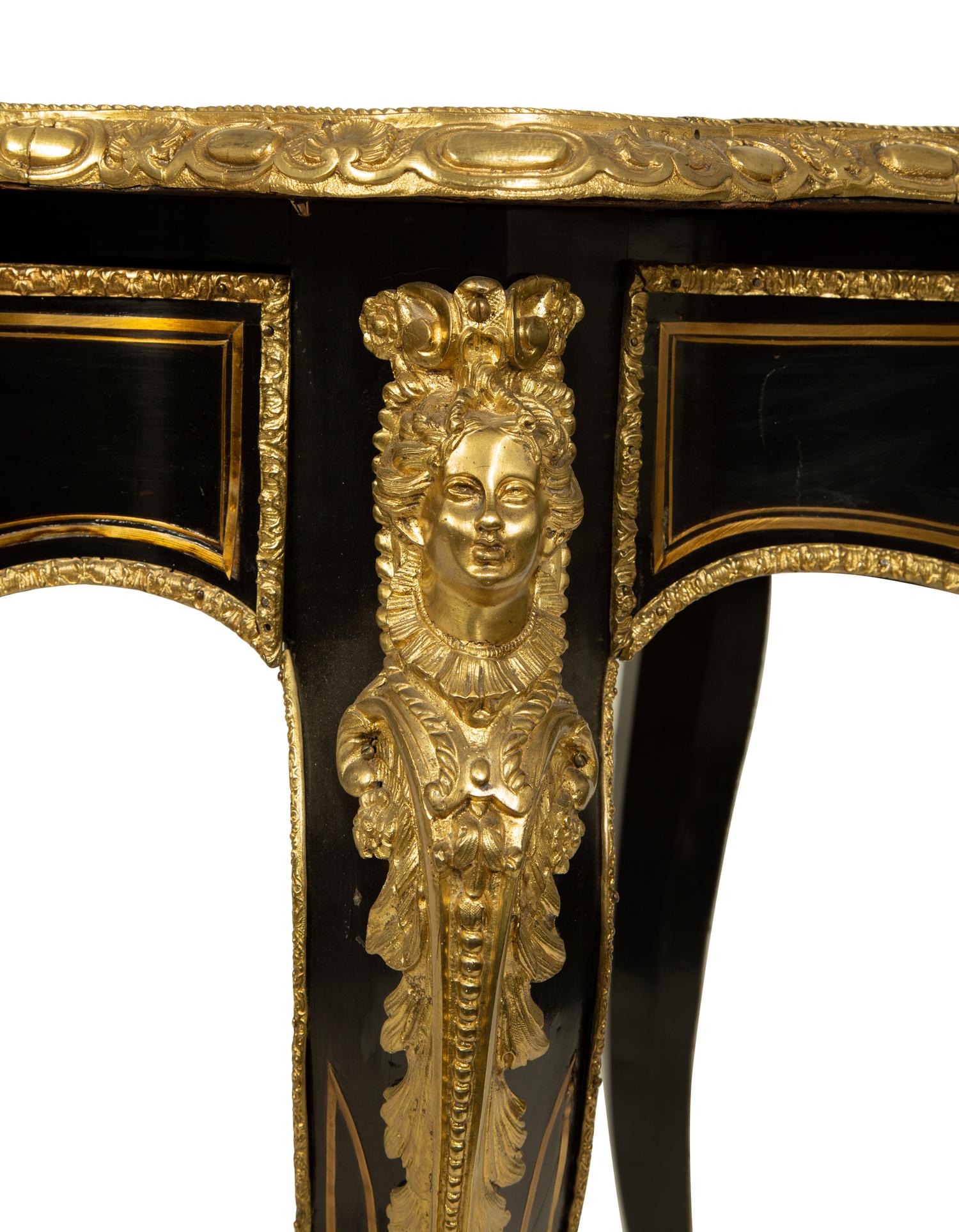 A Napoleon III Style Gilt Bronze Mounted Ebonized Writing Table — LATE 19TH CENTURY