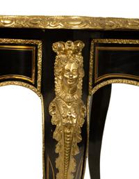 A Napoleon III Style Gilt Bronze Mounted Ebonized Writing Table — LATE 19TH CENTURY