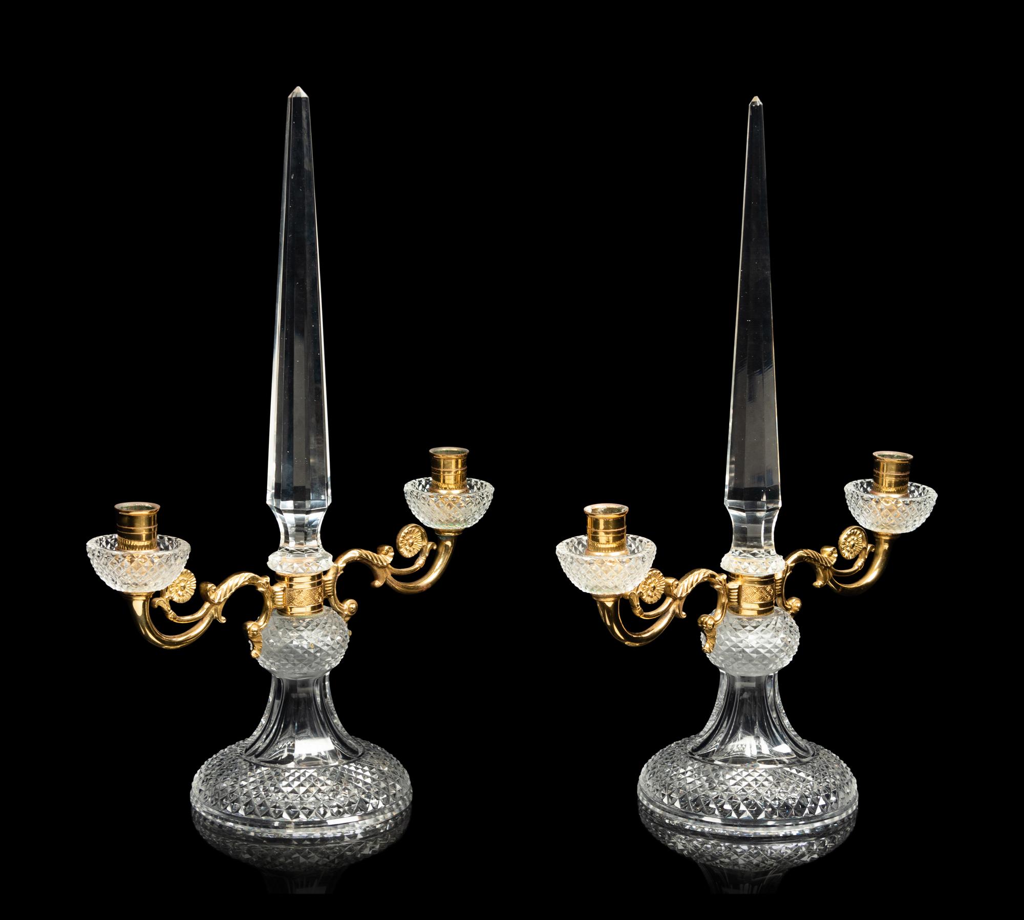 A Pair of Gilt Metal and Cut Glass Obelisk Form Two-Light Candelabra
