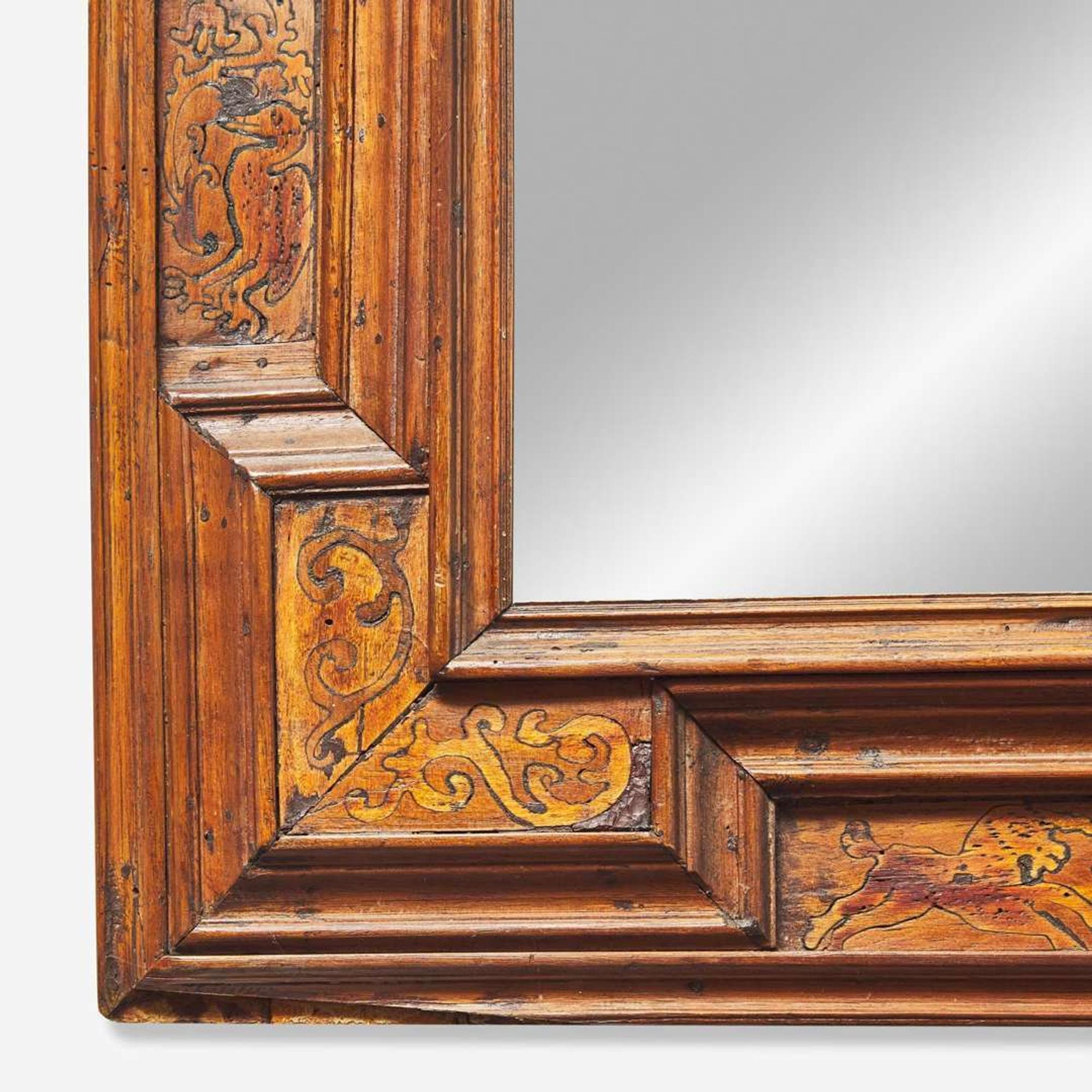 A Continental inlaid walnut and fruitwood paneled mirror late 17th / early 18th century