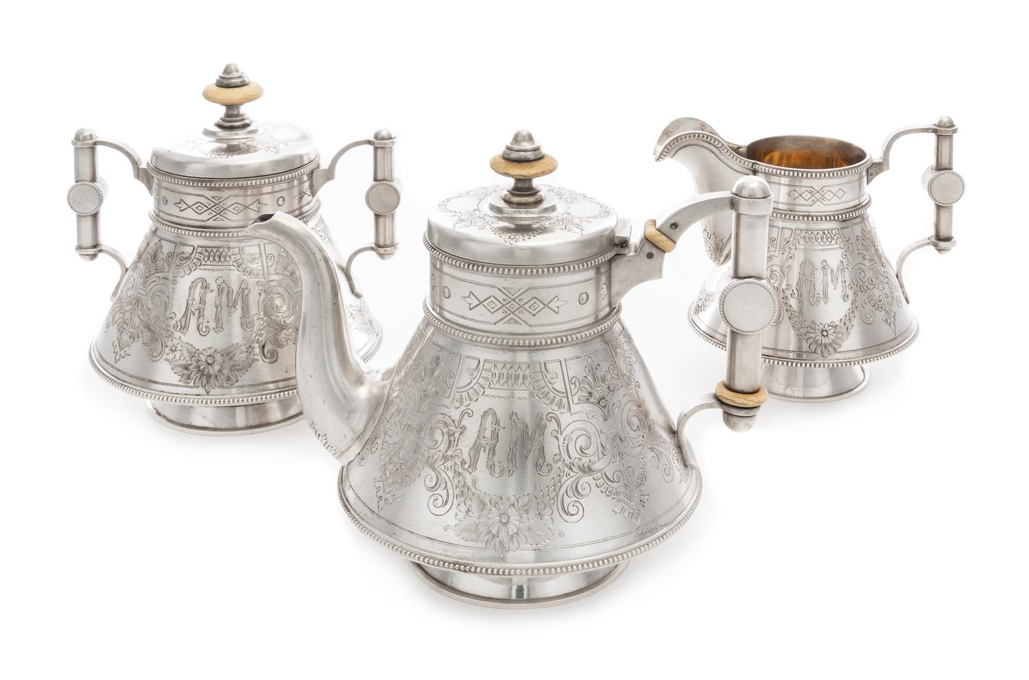 A Russian Silver Three-Piece Tea Service, Maker's Mark PJS, Assay of Alexander Sevier, St. Petersburg, 1884, comprising a teapot, cream