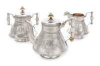 A Russian Silver Three-Piece Tea Service, Maker's Mark PJS, Assay of Alexander Sevier, St. Petersburg, 1884, comprising a teapot, cream