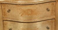 A Silvered Wood Vitrine Cabinet on Three Drawer Bombe Commode Base