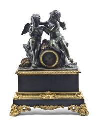 A French Gilt and Patinated Bronze Figural Mantel Clock, Width 16 3/4 inches.