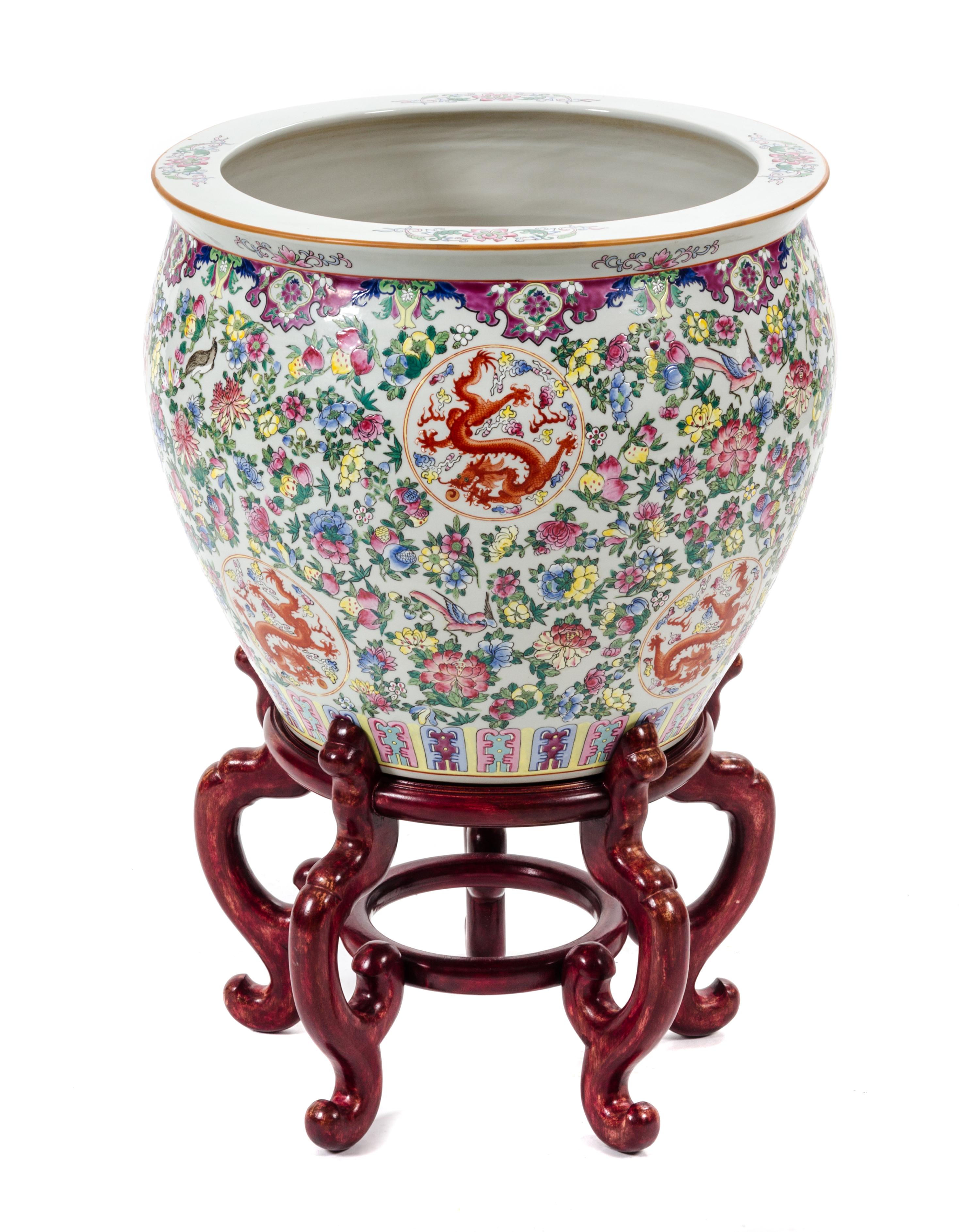 A Chinese Porcelain Fish Bowl Height of fish bowl 18 inches. — 20TH CENTURY