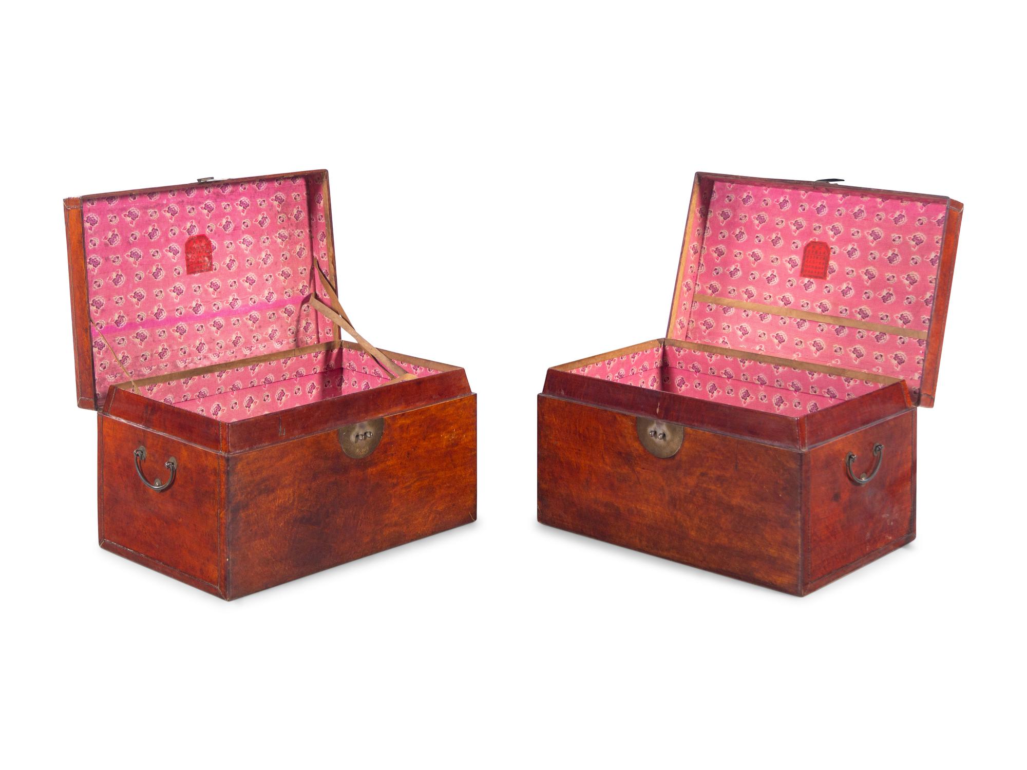 A Pair of Chinese Leather Upholstered Chests