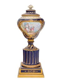 A Sèvres Style Painted and Parcel Gilt Porcelain Urn
