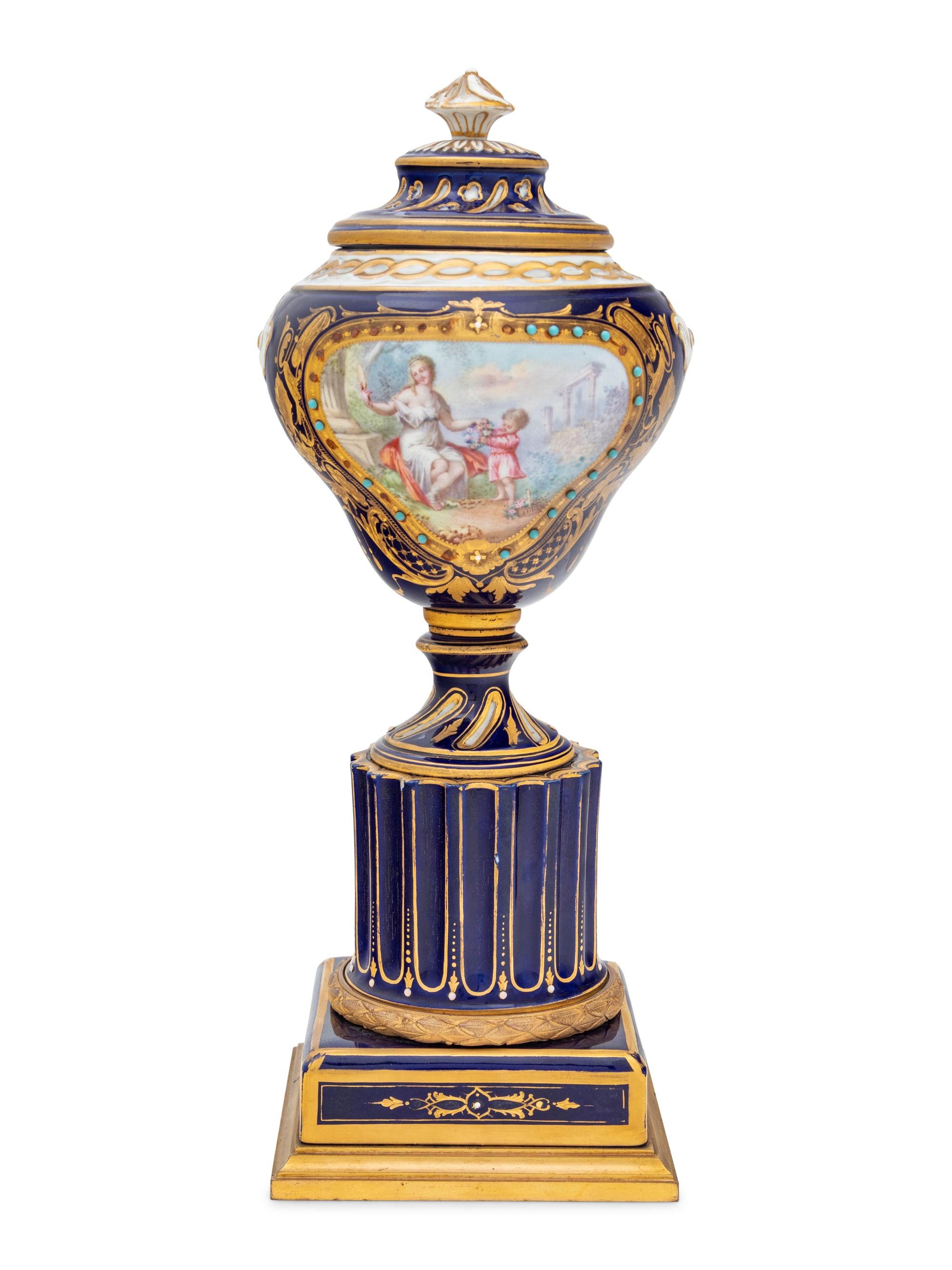 A Sèvres Style Painted and Parcel Gilt Porcelain Urn