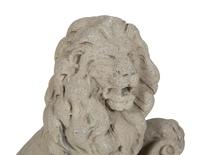 A Pair of Cast Stone Seated Lions