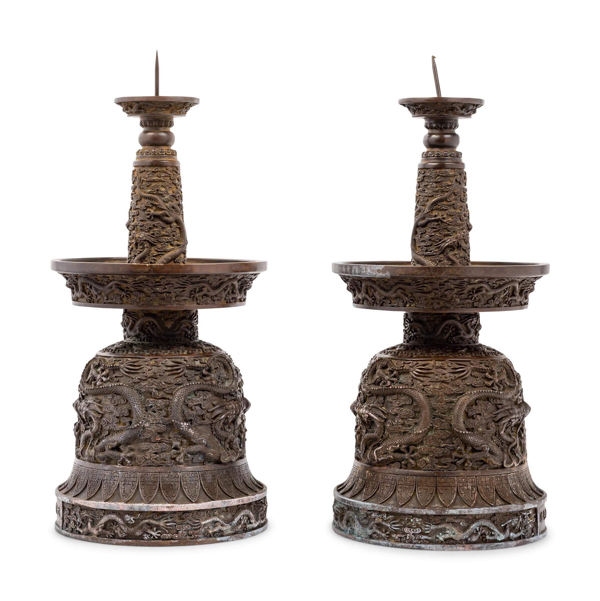A Pair of Chinese Bronze Candle Holders