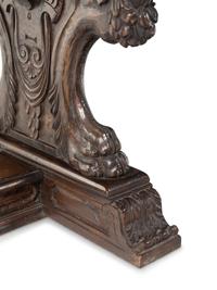 A Florentine Renaissance Style Carved Walnut Trestle Table