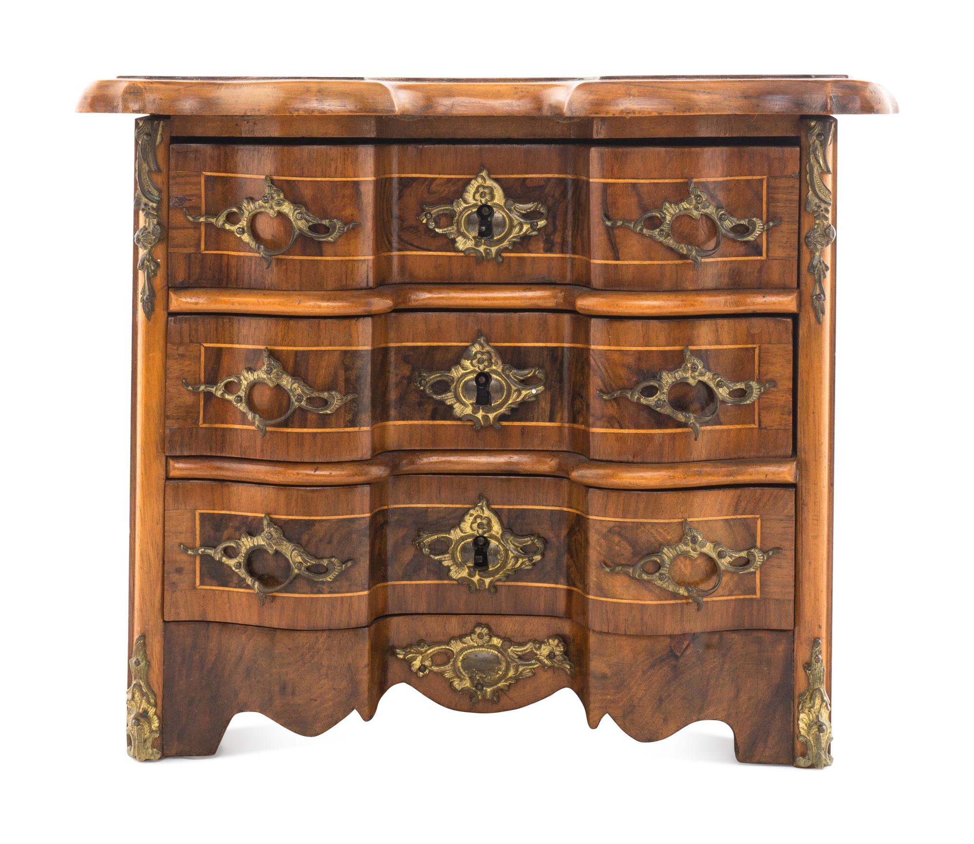 A Louis XV Style Walnut and Kingwood Diminutive Chest of Drawers