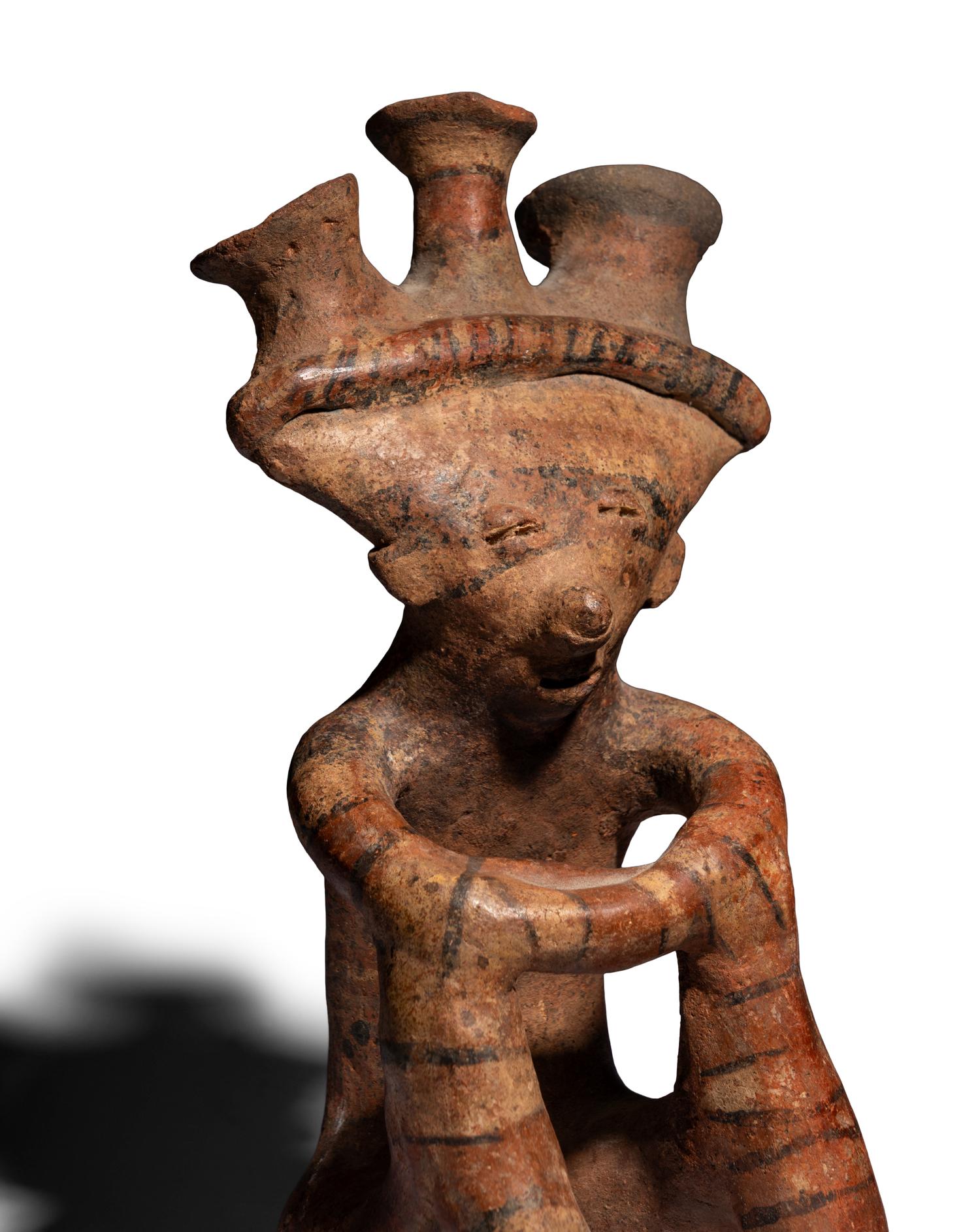 A Nayarit Seated Figure