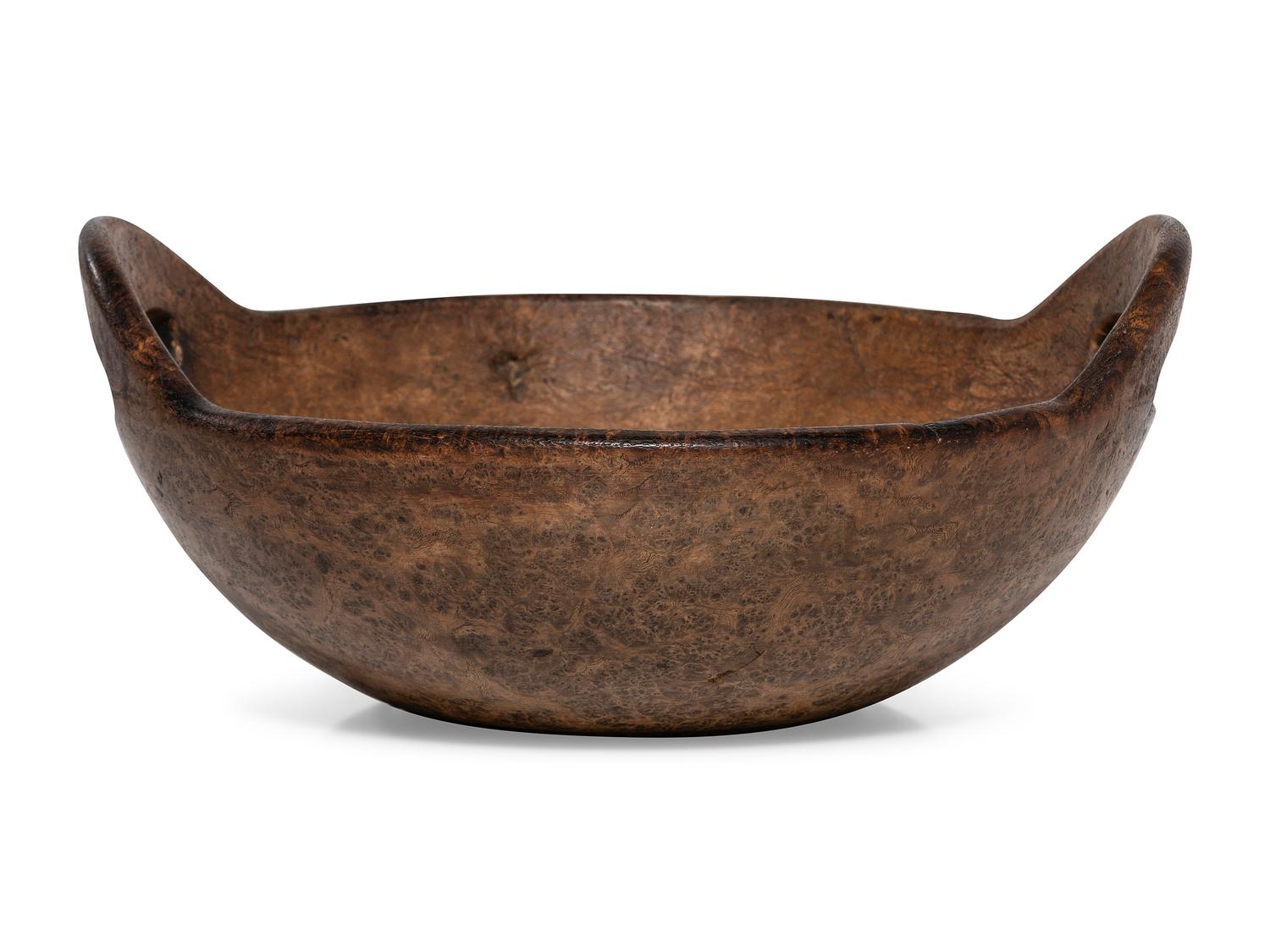 A Fine Turned and Carved Bird's Eye Burl Maple Bowl