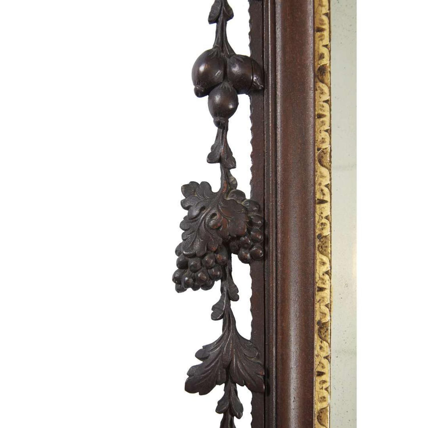 Chippendale carved mahogany looking glass with phoenix cartouche Philadelphia, PA, carving attributed to John Pollard (1740-1787) and