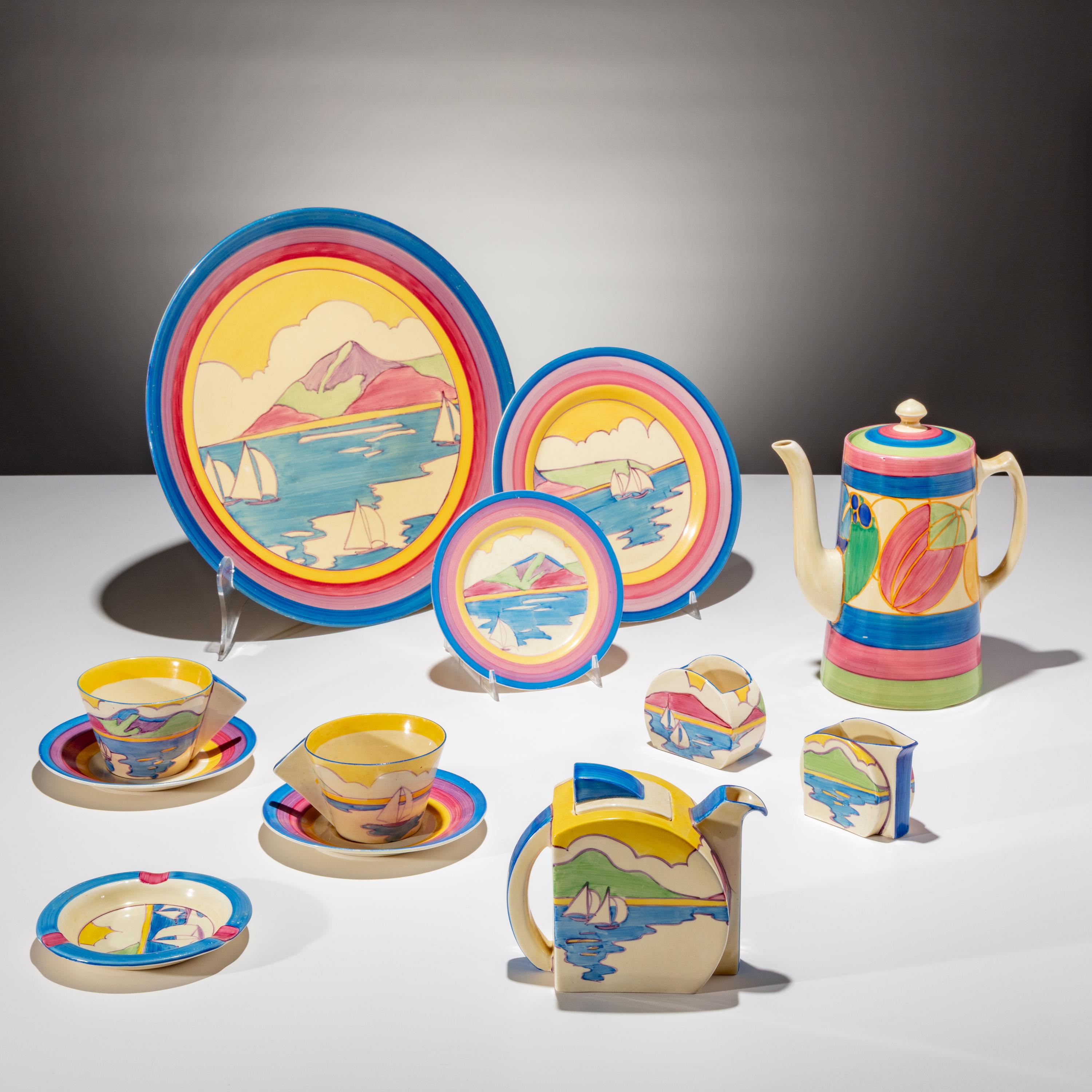 Clarice Cliff (English, 1899–1972) — Gibraltar pattern , 9 pieces and one Melon pattern Coffee Tankard