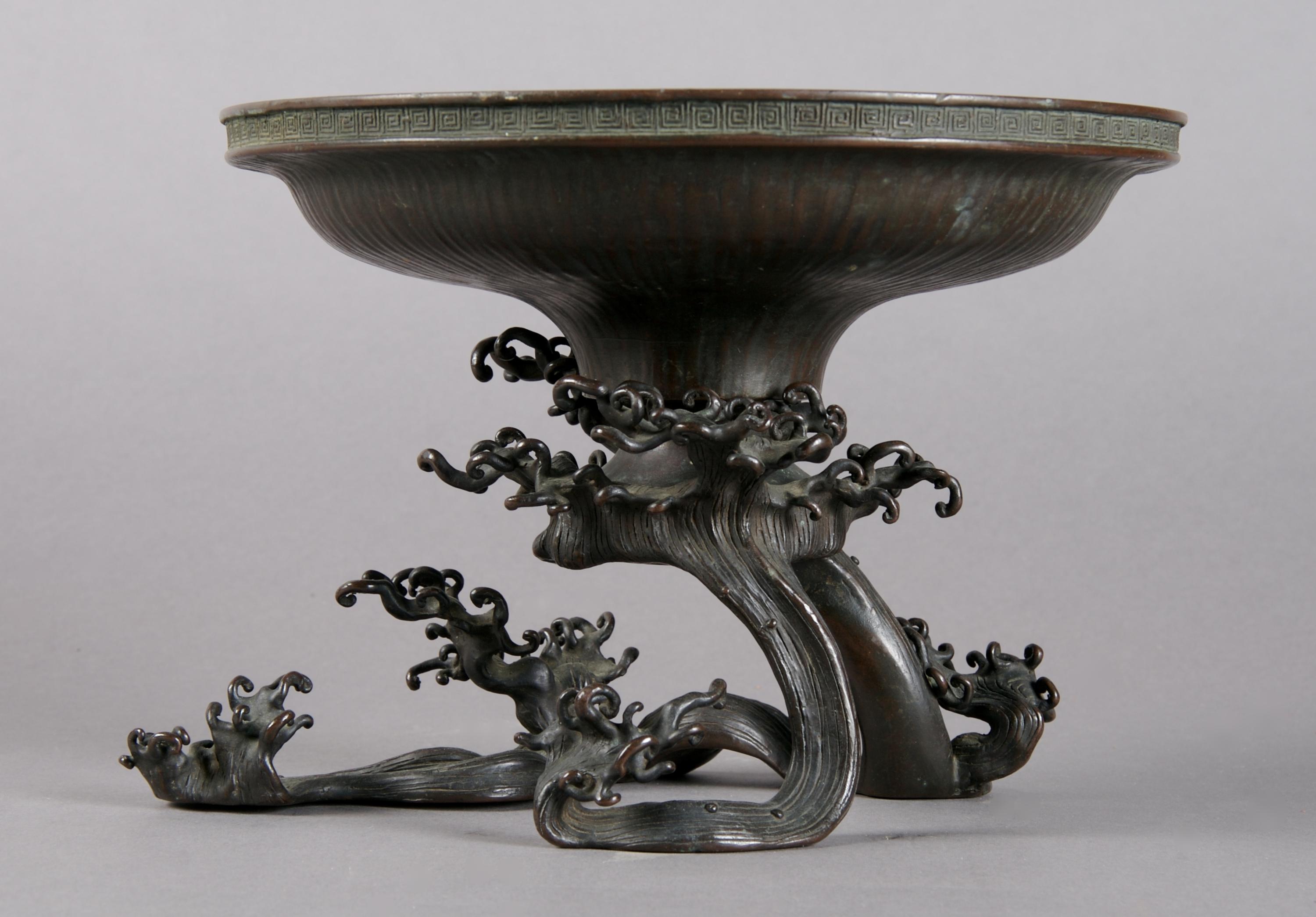 A Japanese Bronze Ikibana, Height 6 inches, diameter 8 1/8 inches.