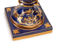 A Pair of Sèvres Style Porcelain Urns