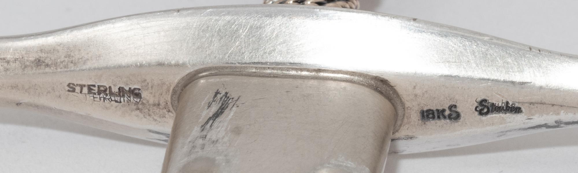 A Steuben Excalibur Silver and Glass Paperweight