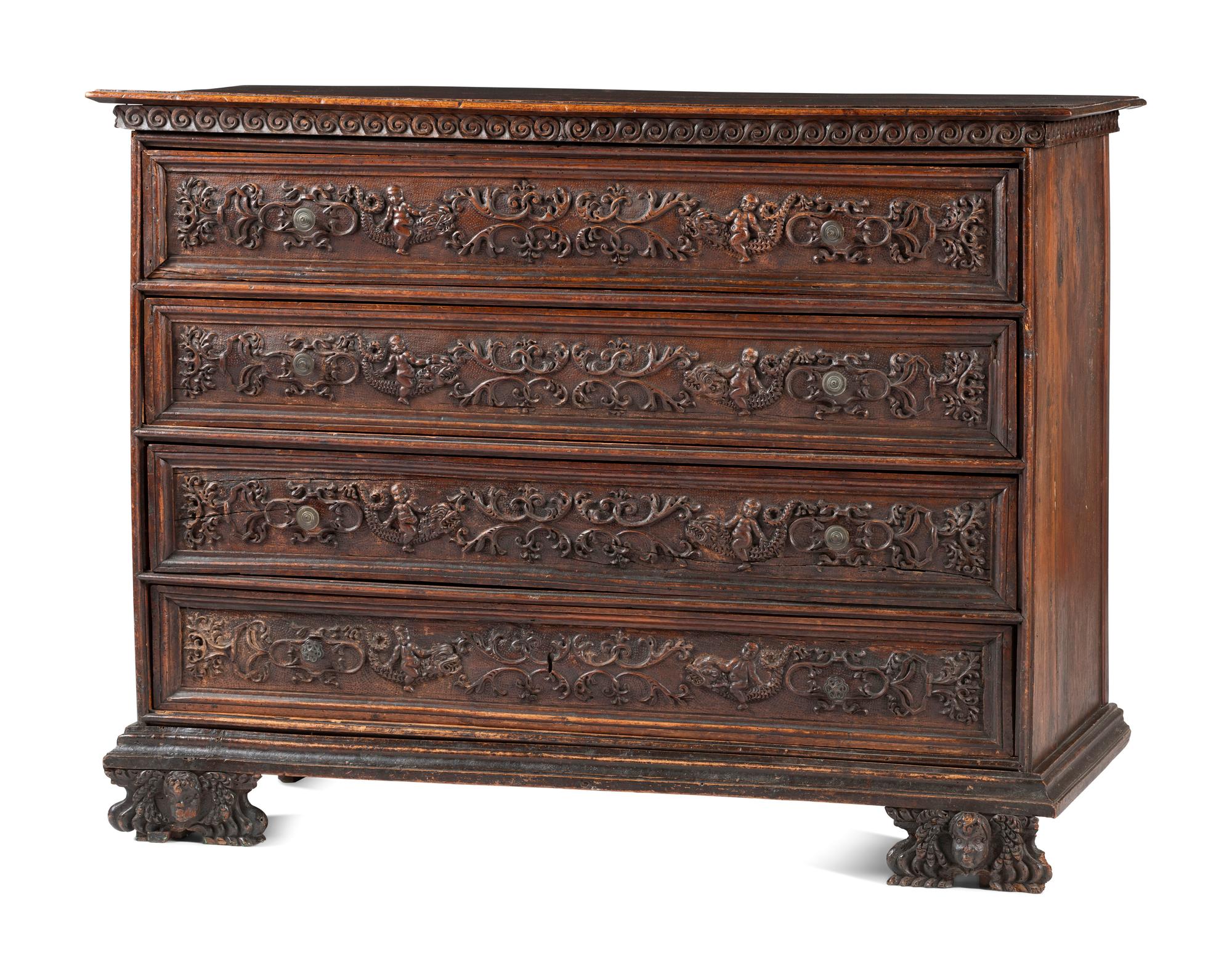 A Baroque Highly Carved Walnut Commode