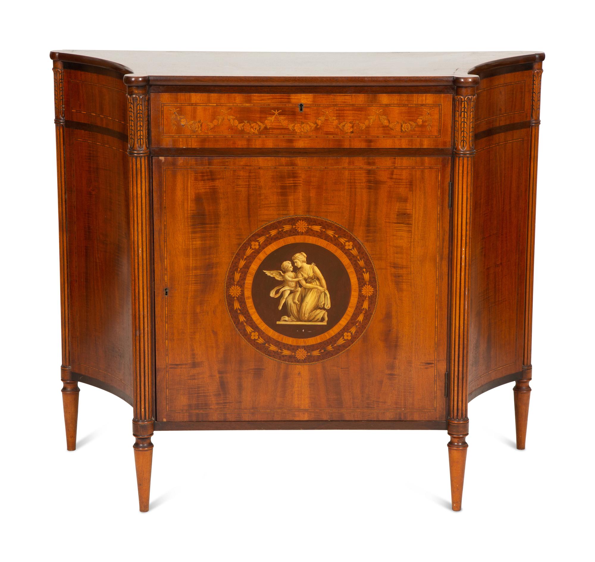 A Joseph Gerte Mahogany and Marquetry Commode
