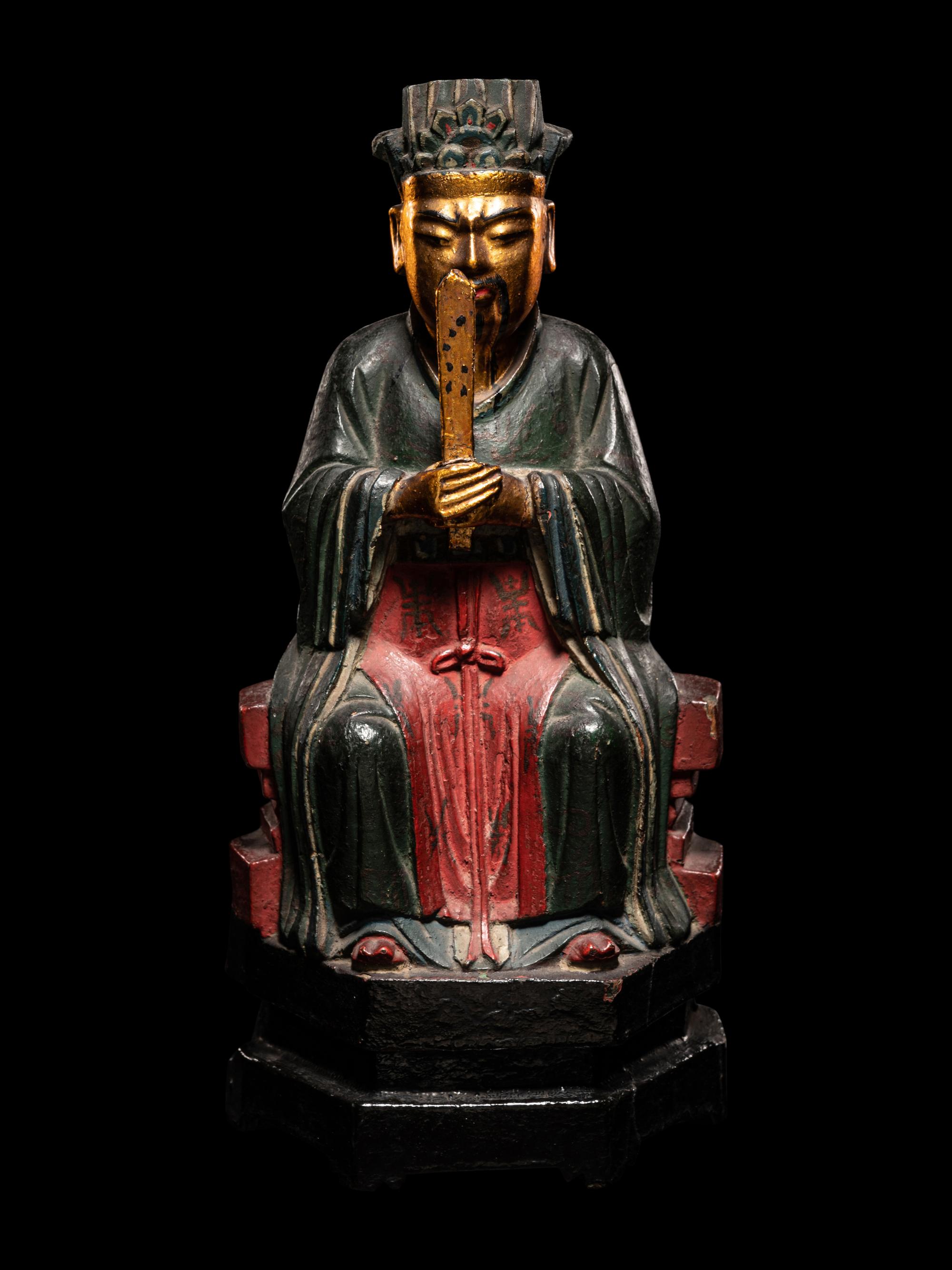 A Chinese Gilt, Red, and Black Lacquered Wood Figure of an Official