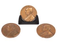 [MILITARIA]. Collection of over 75 late 19th-early 20th century medals, pinbacks, and souvenirs, with books and Civil War ephemera, including: