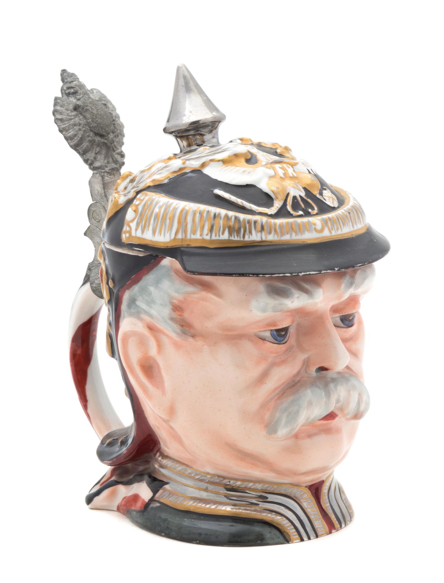 A German Pewter Mounted Porcelain Figural Stein Height 7 1/4 inches.