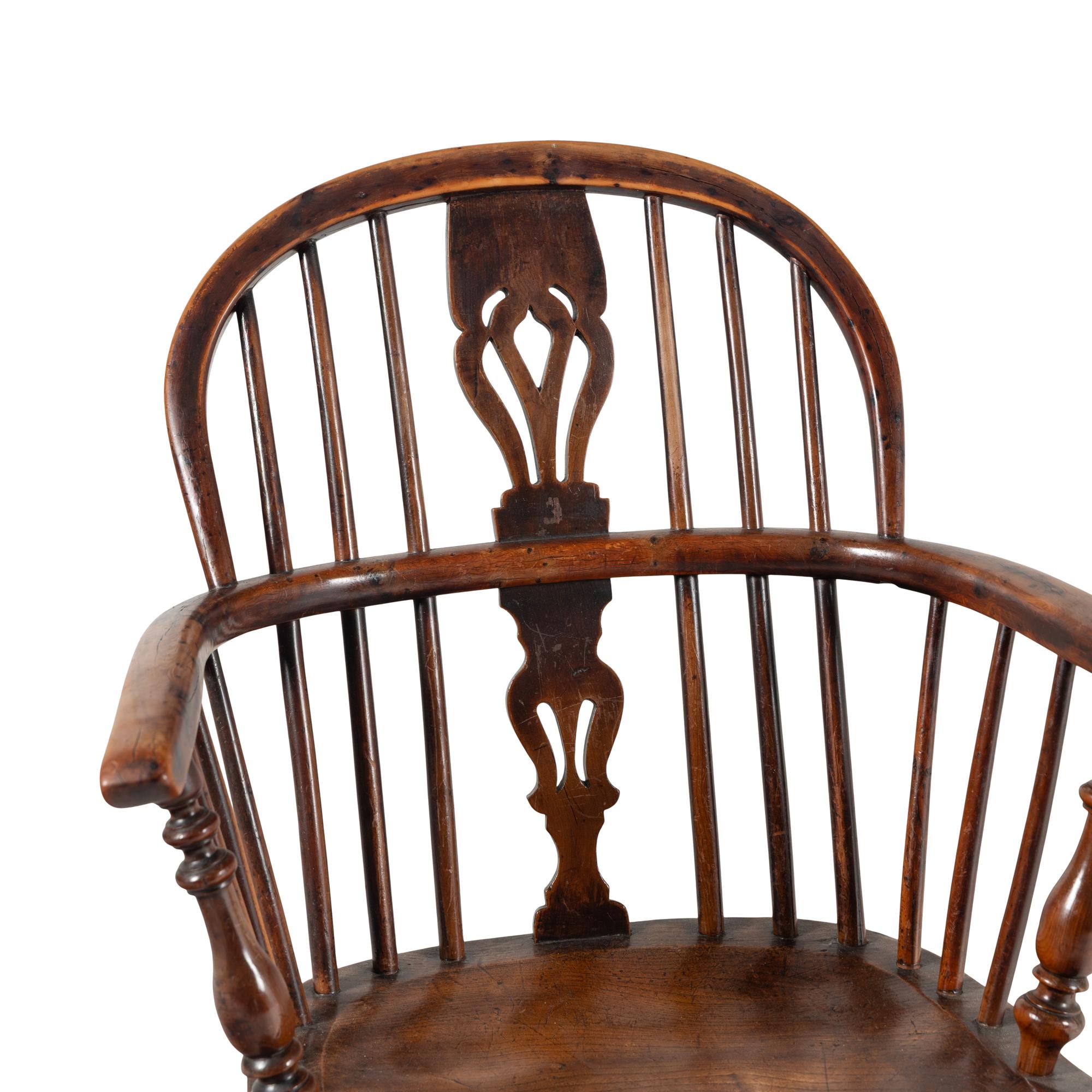 A Set of Six Yew and Elm Windsor Chairs