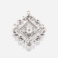 A fourteen karat gold and diamond pendant