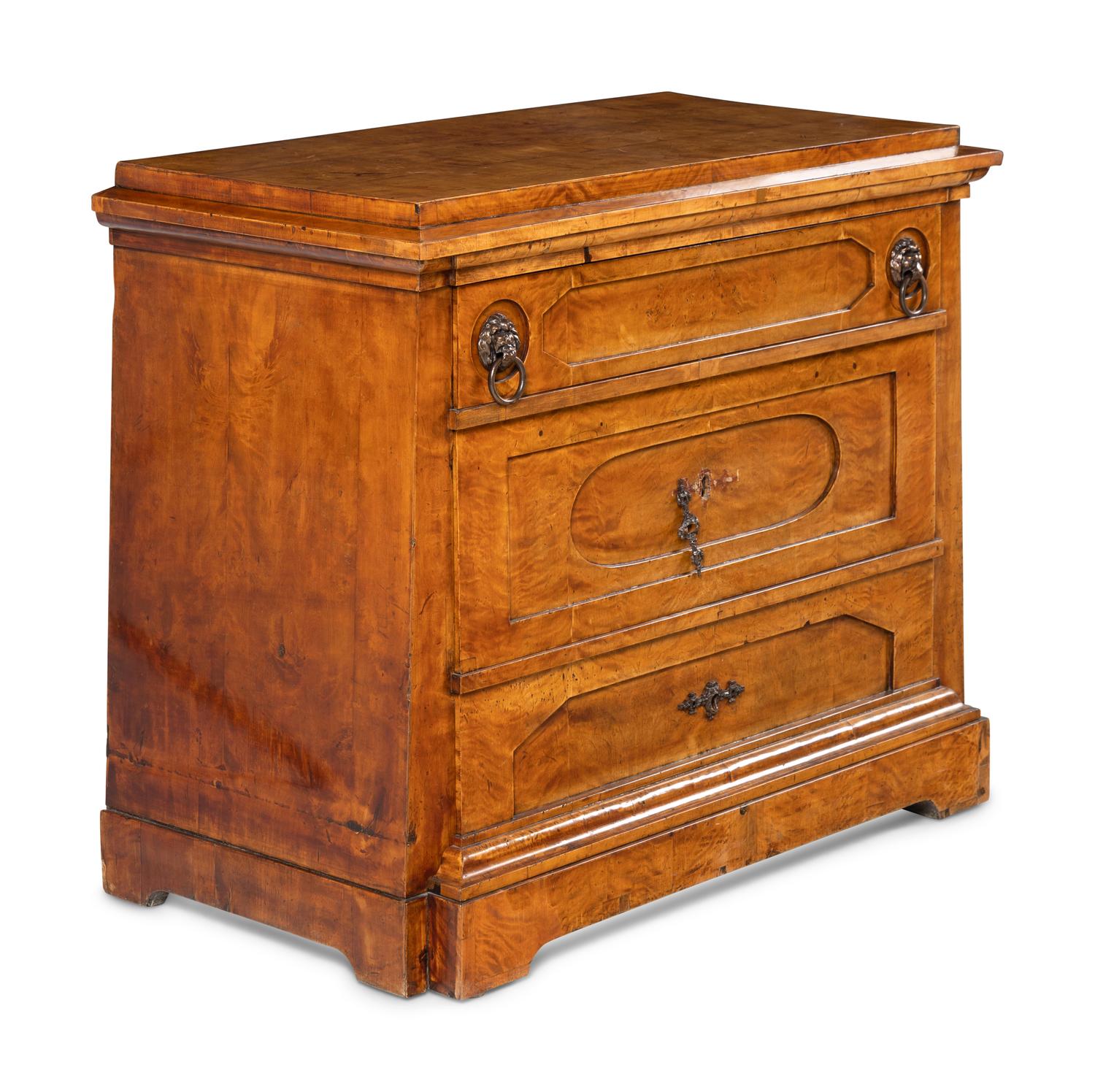 A Continental Figured Birch Commode
